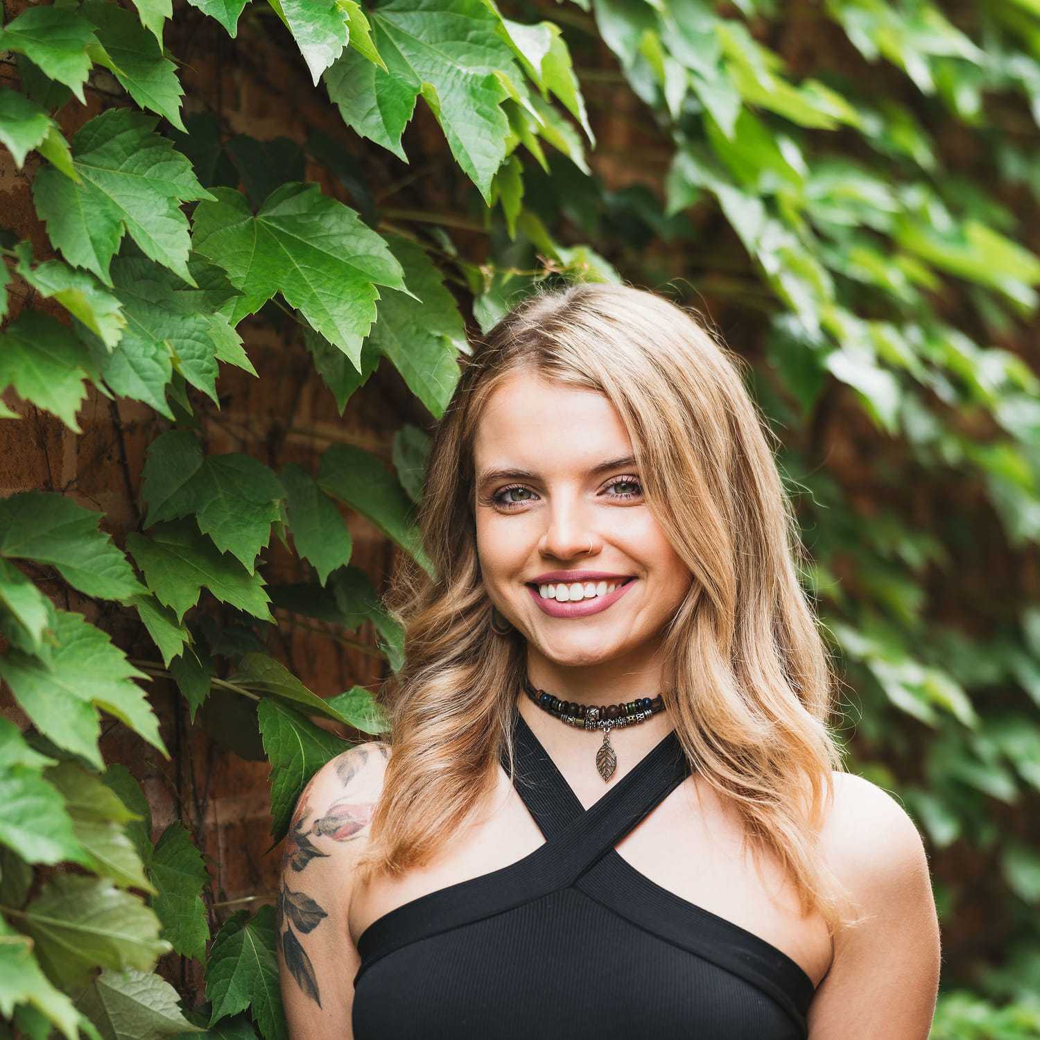 Portrait of Anna, a professional stylist at Anasa Salon, showcasing their expertise and style.